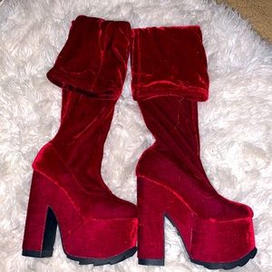 Red thigh high velvet boots